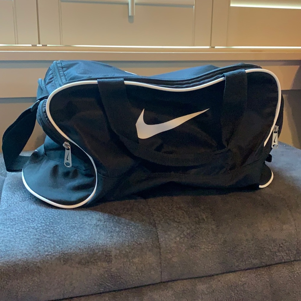 Black Nike duffel bag